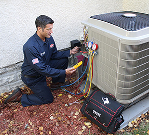 one of our pros is repairing an AC unit