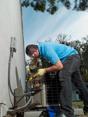 Liam, one of our furnace and AC Repair in Montgomery Village pros is repairing a broken unit