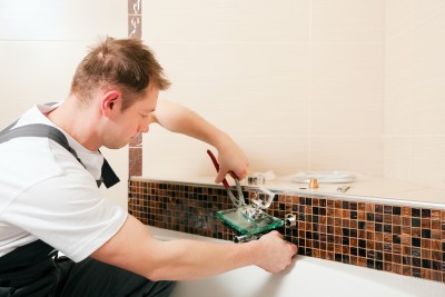 Mike, one of our Montgomery Village plumbing pros is repairing a bathroom leak 